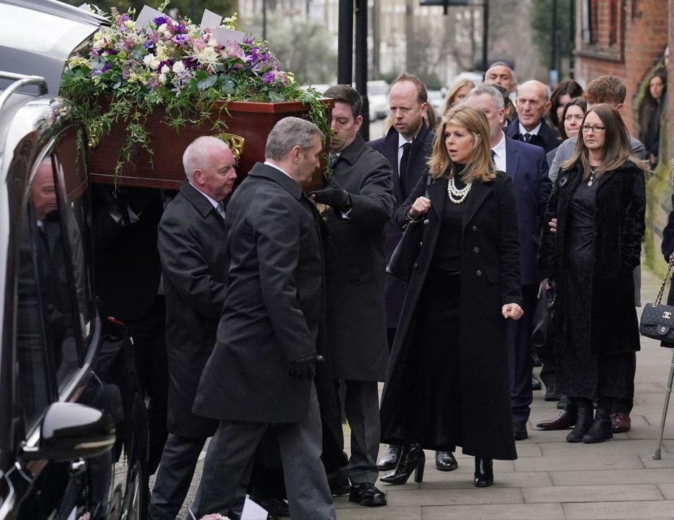 Kate Garraway followed the coffin as it was led into the church (PA)