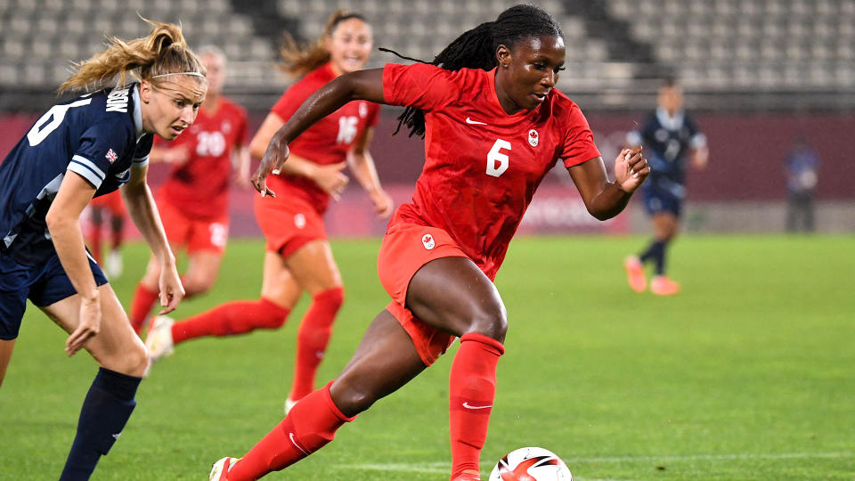 Deanne Rose controls the ball during the Tokyo 2020 Olympic Games women's Group E match between Canada and Britain. (Photo by SHINJI AKAGI / AFP) (Photo by SHINJI AKAGI/AFP via Getty Images)