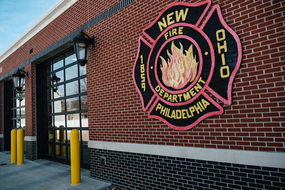 New Philadelphia has been ordered to reinstate a former fire captain who was fired in July after being charged with domestic violence.