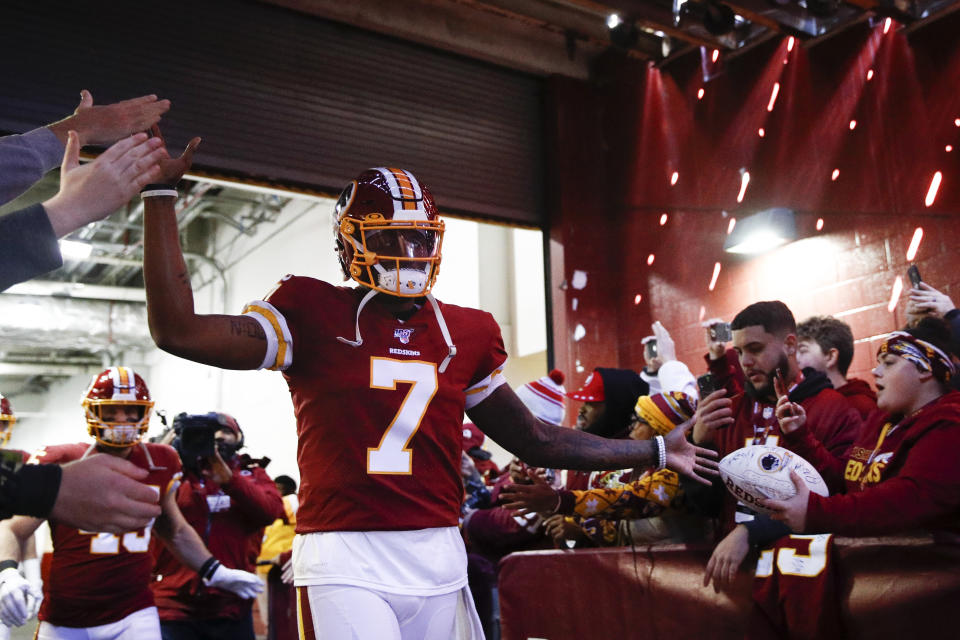 Washington Redskins quarterback Dwayne Haskins (7) greets fans before the start of an NFL football game against the Philadelphia Eagles, Sunday, Dec. 15, 2019, in Landover, Md. (AP Photo/Patrick Semansky)