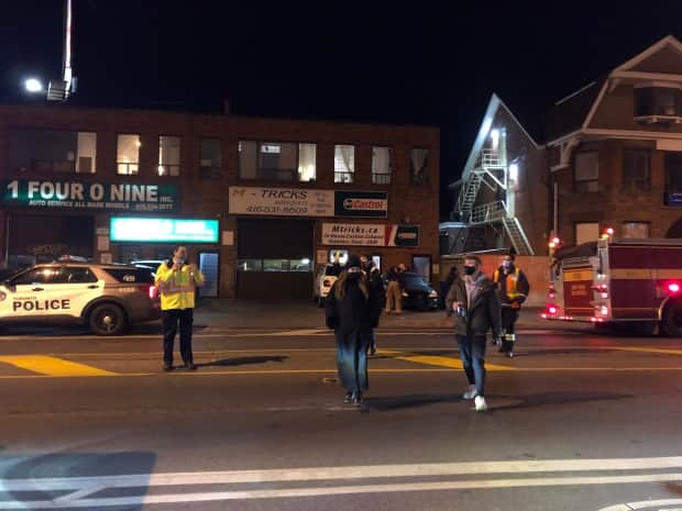 Residents were evacuated from their building on Bloor Street West early Wednesday morning after a resident's carbon monoxide detector went off. After multiple city and fire crew investigations, the residents were told they had 24 hours to vacate their units. (Miles Gertler - image credit)