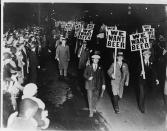 <p>During Prohibition in the U.S., federal officials <a href="https://slate.com/technology/2010/02/the-little-told-story-of-how-the-u-s-government-poisoned-alcohol-during-prohibition.html" rel="nofollow noopener" target="_blank" data-ylk="slk:ordered industrial alcohol manufacturers to "denature" their products;elm:context_link;itc:0;sec:content-canvas" class="link ">ordered industrial alcohol manufacturers to "denature" their products</a> with chemicals like kerosene, iodine, and chloroform, which not only made the alcohol taste worse than it already did, but it also often made it deadly. Around 1927, the Treasury Department also told manufacturers to add more methyl alcohol to their product, so that it comprised 10 percent of the total products, according to Slate.</p><p>Once Prohibition ended in 1933, some estimates accuse the government of being responsible for the deaths of 10,000 people through its alcohol poisoning program.</p>