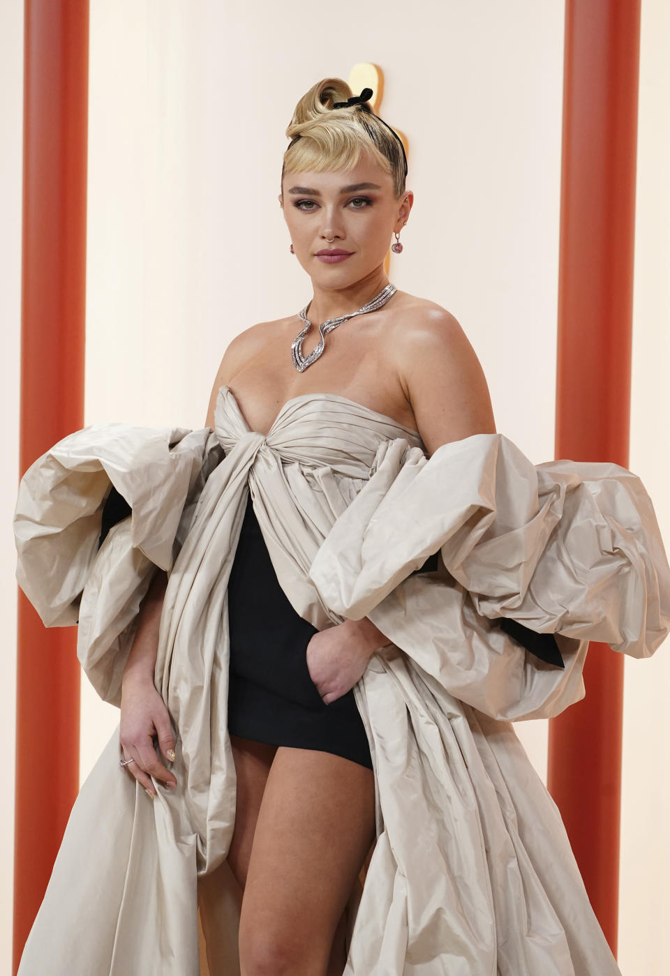 Florence Pugh arrives at the Oscars on Sunday, March 12, 2023, at the Dolby Theatre in Los Angeles. (Photo by Jordan Strauss/Invision/AP)