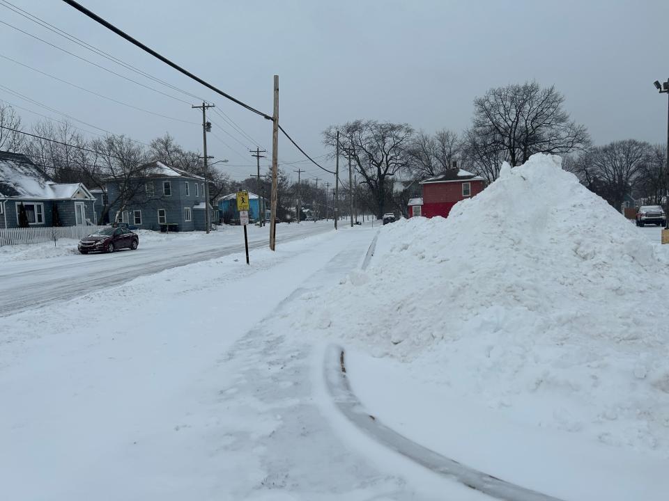 Snow piles up in spots throughout downtown Sault Ste. Marie on Jan. 13, 2024.