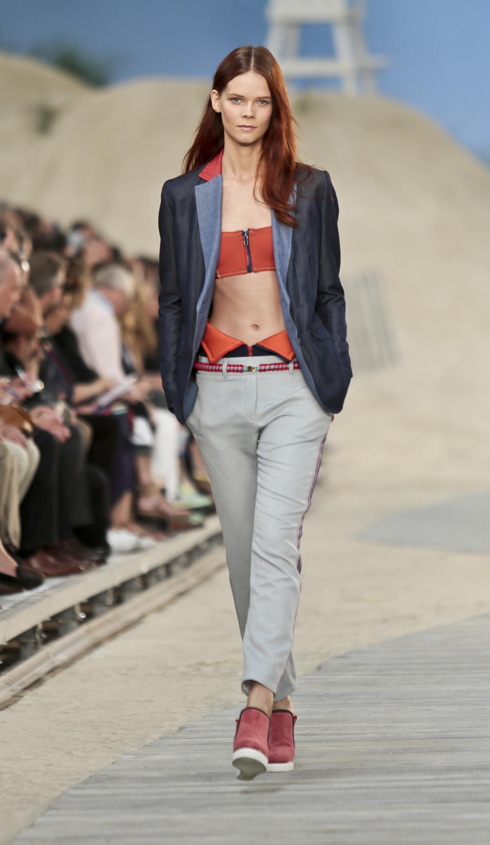 Fashion from the Tommy Hilfiger Spring 2014 collection is modeled on Monday, Sept. 9, 2013 in New York. (AP Photo/Bebeto Matthews)