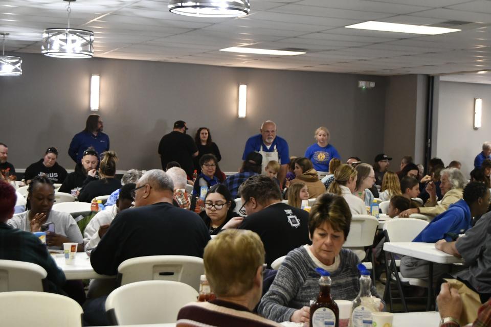 Members of the Fremont Kiwanis and Key clubs were busy serving pancakes on Wednesday at jam-packed Victor's Banquet Hall.