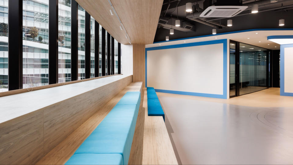 The office features HoYoverse's signature colour theme. (Photo: HoYoverse)
