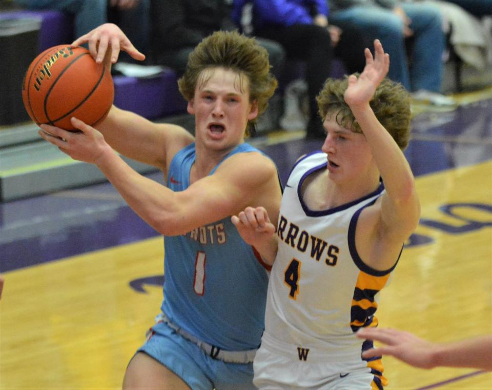 Sioux Falls Lincoln's Edison Noll drives against Watertown's Dylon Rawdon during their high school boys basketball game on Tuesday, Jan. 30, 2024 in the Watertown Civic Arena. Lincoln won 61-54.