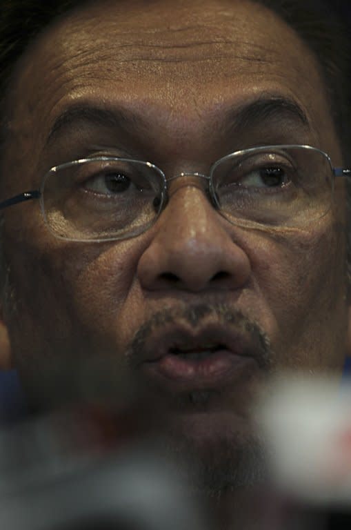 Malaysia's opposition leader Anwar Ibrahim speaks during a press conference at his party's headquarters in Kuala Lumpur, on April 23, 2013. Current premier Najib Razak and Anwar on April 20 kicked off their campaigns for the May 5 election, likely to be the country's closest ever