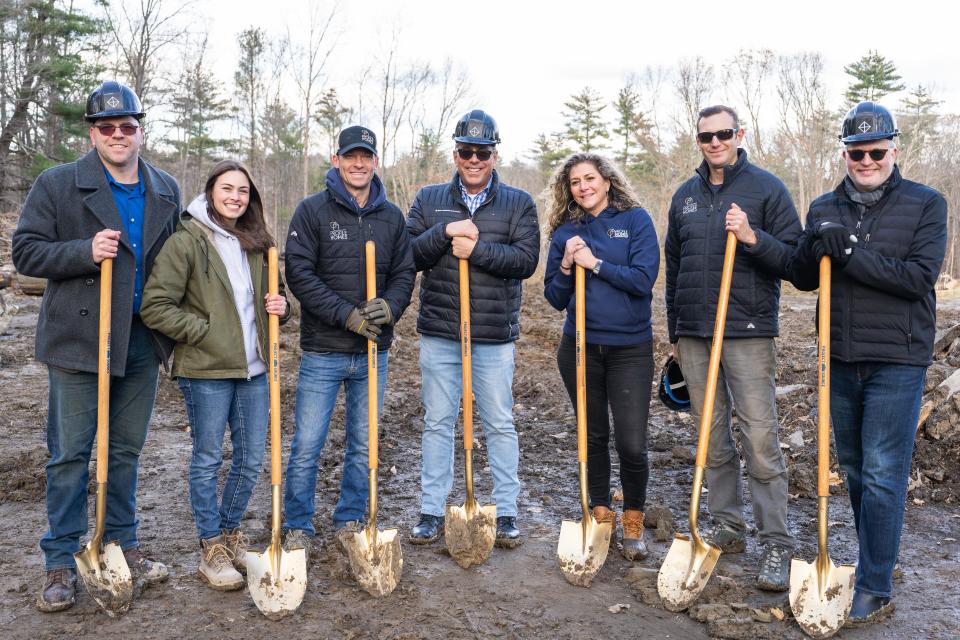 Developer and founder of Profile Homes Matt Silva (third from left) and Brick and Barn Group realtor Scott Rome (far right) at the groundbreaking of the Rose Farm project on Tuesday, Nov. 28.