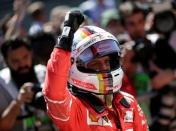 Formula One F1 - Brazilian Grand Prix 2017 - Sao Paulo, Brazil - November 12, 2017 Ferrari's Sebastian Vettel celebrates winning the race REUTERS/Ueslei Marcelino