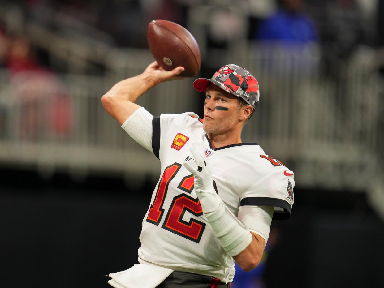 Tom Brady #12 of the Tampa Bay Buccaneers warms up against the Atlanta Falcons at Mercedes-Benz Stadium on January 8, 2023 in Atlanta, Georgia