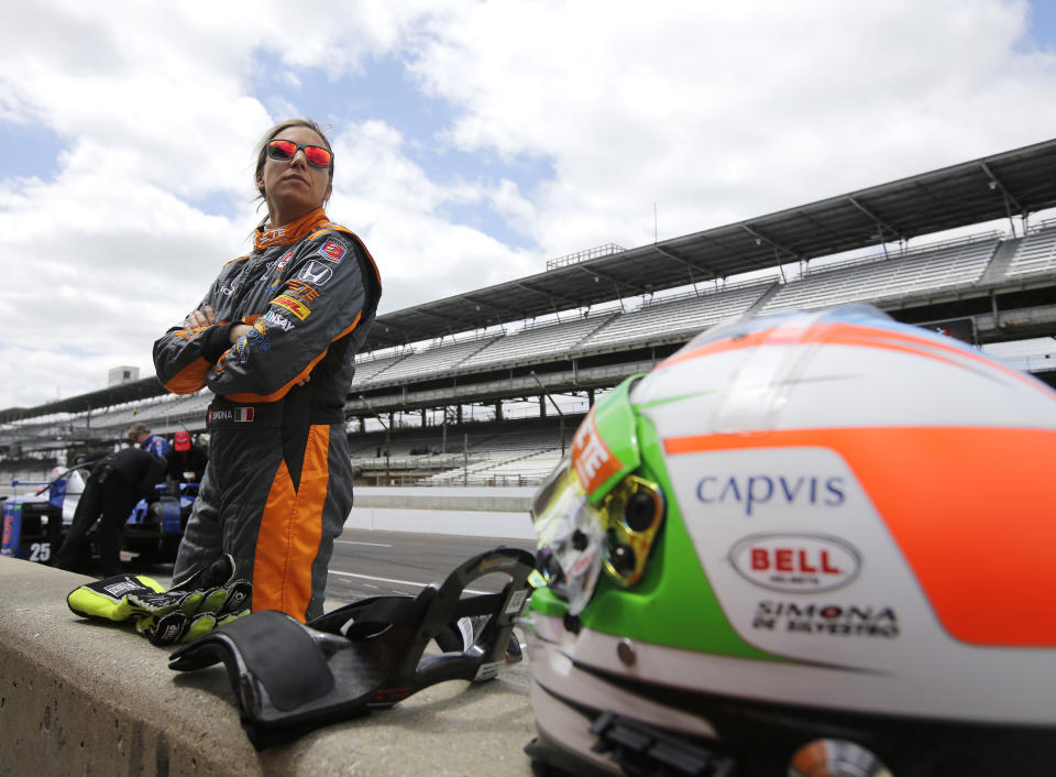 FILE - In this May 12, 2015, file photo, driver Simona de Silvestro, of Switzerland, watches during practice for the Indianapolis 500 auto race at Indianapolis Motor Speedway in Indianapolis. Beth Paretta and Simona de Silvestro will be teaming up to put another woman on the Indianapolis 500 starting grid this May. On Tuesday, Jan. 19, 2021, Paretta Autosport and IndyCar officials announced they would work together to put a predominantly women-run team in the series' biggest race as part of an outreach to create more diversity in motorsports. (AP Photo/Darron Cummings, File)