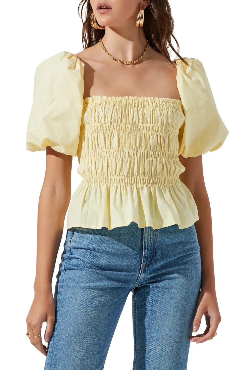 <p>This pretty <span>ASTR the Label Bubble-Sleeve Smocked Blouse</span> ($39, originally $65) totally nails the cottagecore aesthetic. It comes in several other colors like pink, white, and light blue. Wear it with cutoff shorts for summer.</p>