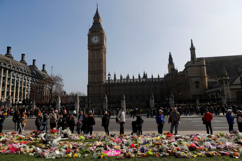 Floral tributes lie in Parliament Square following the attack in Westminster, central London, Britain March 27, 2017. REUTERS/Stefan Wermuth