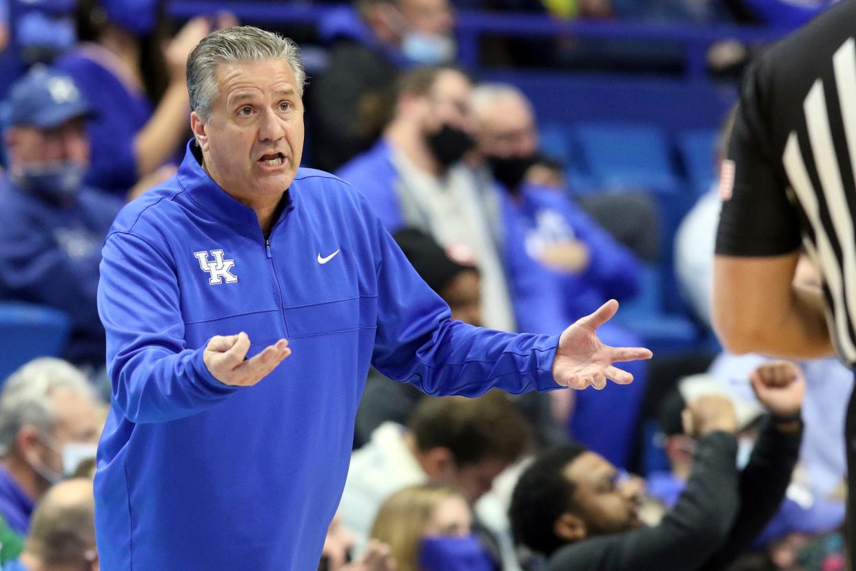 Kentucky head coach John Calipari questions an official during the second half of an NCAA college basketball game against Central Michigan in Lexington, Ky., Monday, Nov. 29, 2021. Kentucky won 85-57. (AP Photo/James Crisp)