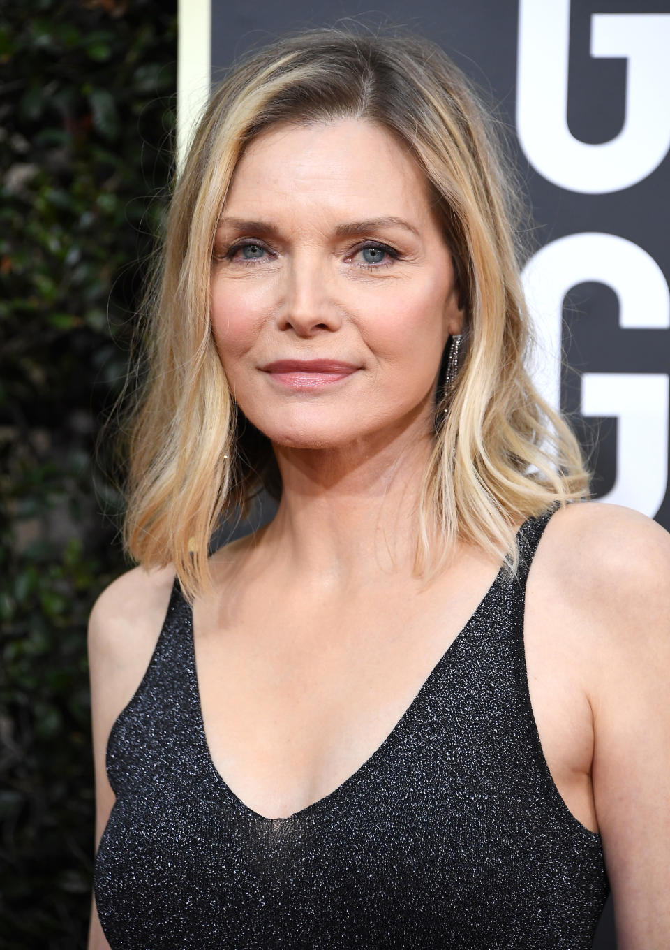 Michelle Pfeiffer wears a black strappy dress at the 77th Annual Golden Globe Awards at The Beverly Hilton Hotel on January 05, 2020 in Beverly Hills, California.