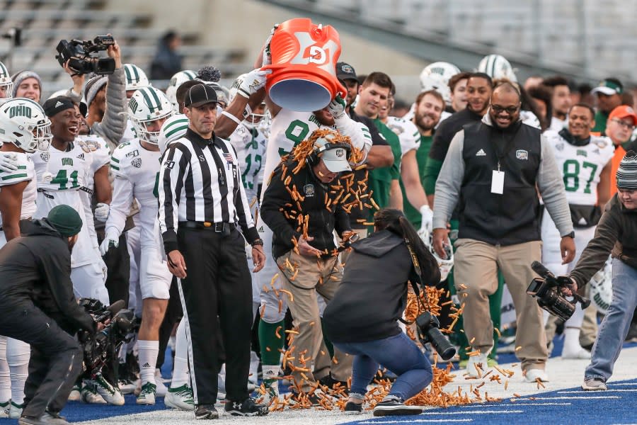 BOISE, ID – JANUARY 3: Head Coach Frank Solich of the Ohio Bobcats gets showered with french fries during second half action against the Nevada Wolf Pack at the Famous Idaho Potato Bowl on January 3, 2020 at Albertsons Stadium in Boise, Idaho. Ohio won the game 30-21. (Photo by Loren Orr/Getty Images)