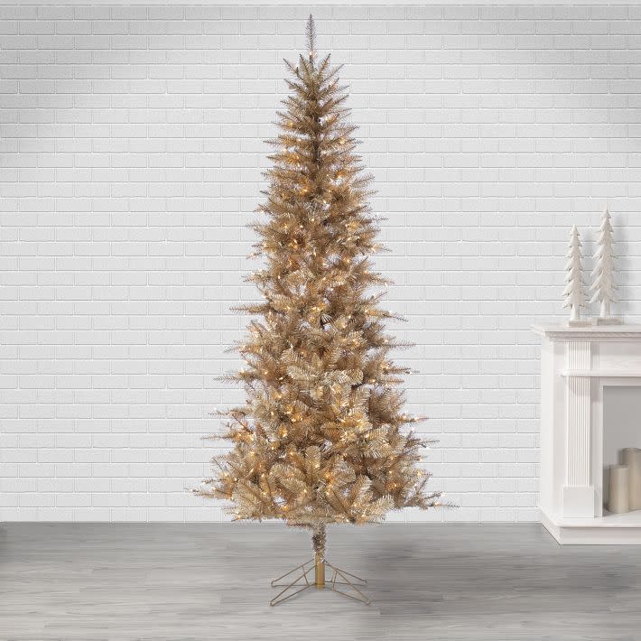 <p><a href="https://go.redirectingat.com?id=74968X1596630&url=https%3A%2F%2Fwww.westelm.com%2Fproducts%2Ffrasier-tinsel-trees-d6634&sref=https%3A%2F%2Fwww.countryliving.com%2Flife%2Fg45360866%2Fpink-christmas-tree-ideas%2F" rel="nofollow noopener" target="_blank" data-ylk="slk:Shop Now;elm:context_link;itc:0;sec:content-canvas" class="link ">Shop Now</a></p><p>Rose Gold Pre-Lit Tuscany Christmas Tree</p><p>westelm.com</p><p>$130.00</p><span class="copyright">West Elm</span>