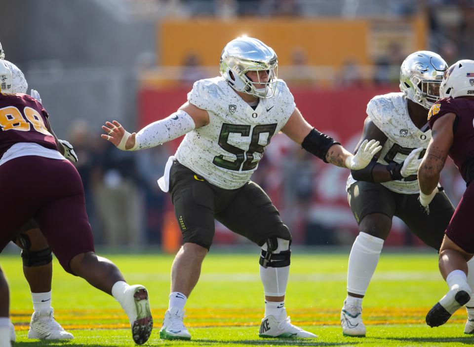 Nov 18, 2023; Tempe, Arizona, USA; Oregon Ducks offensive lineman Jackson Powers-Johnson (58) against the Arizona State Sun Devils at Mountain America Stadium. Mandatory Credit: Mark J. Rebilas-USA TODAY Sports