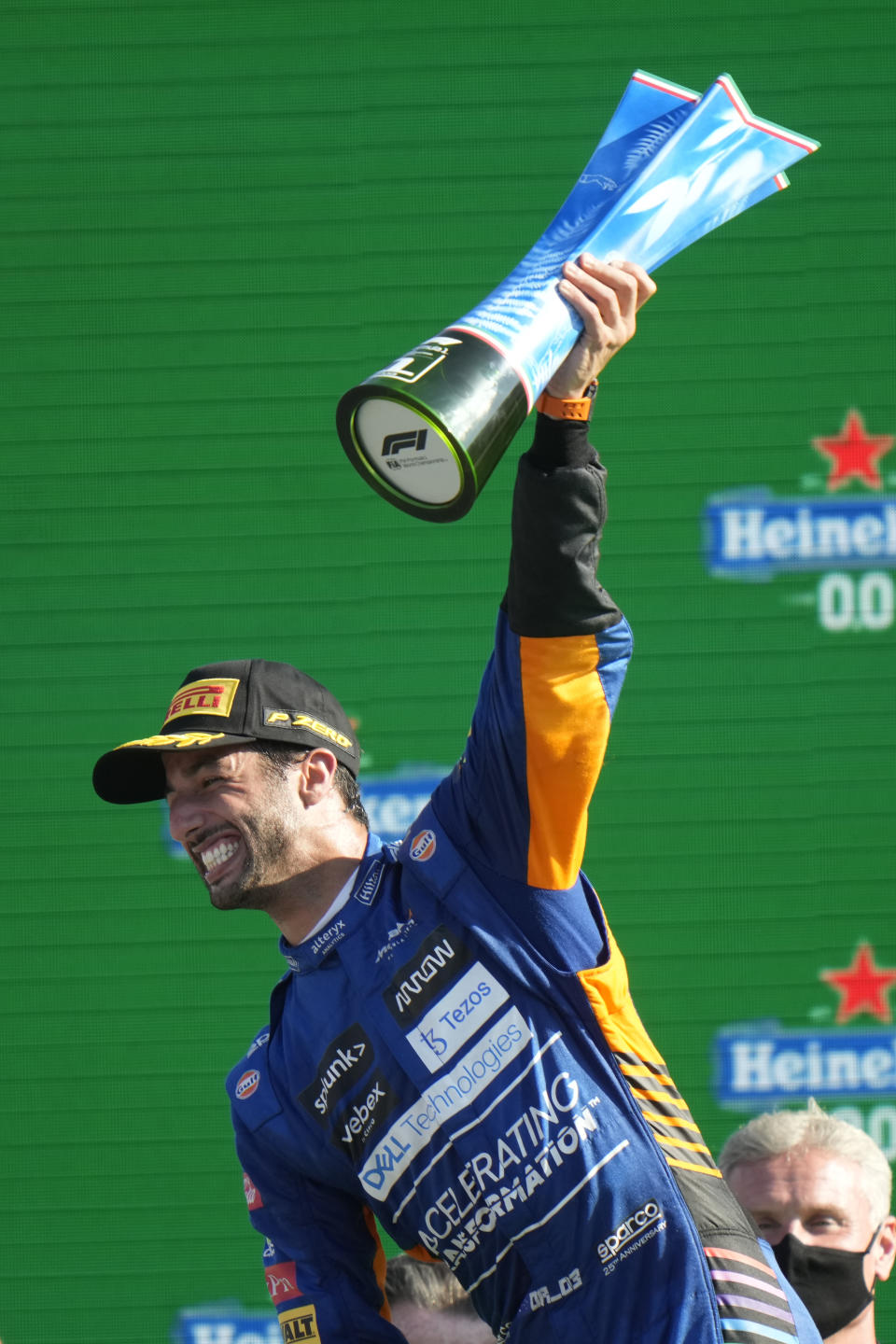 Mclaren driver Daniel Ricciardo of Australia celebrates after winning during the Italian Formula One Grand Prix, at Monza racetrack, in Monza, Italy, Sunday, Sept.12, 2021. (AP Photo/Luca Bruno)