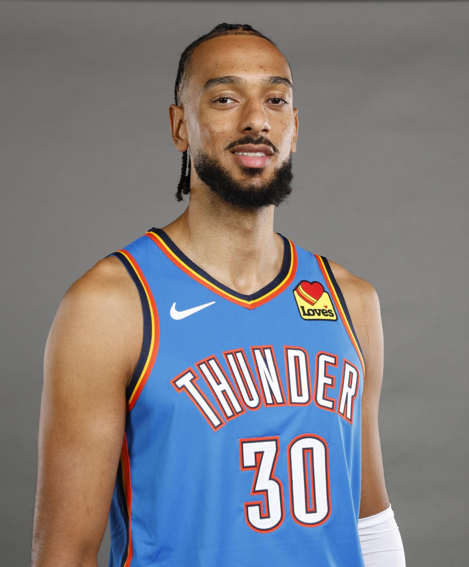 Oct 2, 2023; Oklahoma City, OK, USA; Oklahoma City Thunder center Olivier Sarr (30) poses for photo during media day at Oklahoma City Convention Center. Mandatory Credit: Alonzo Adams-USA TODAY Sports