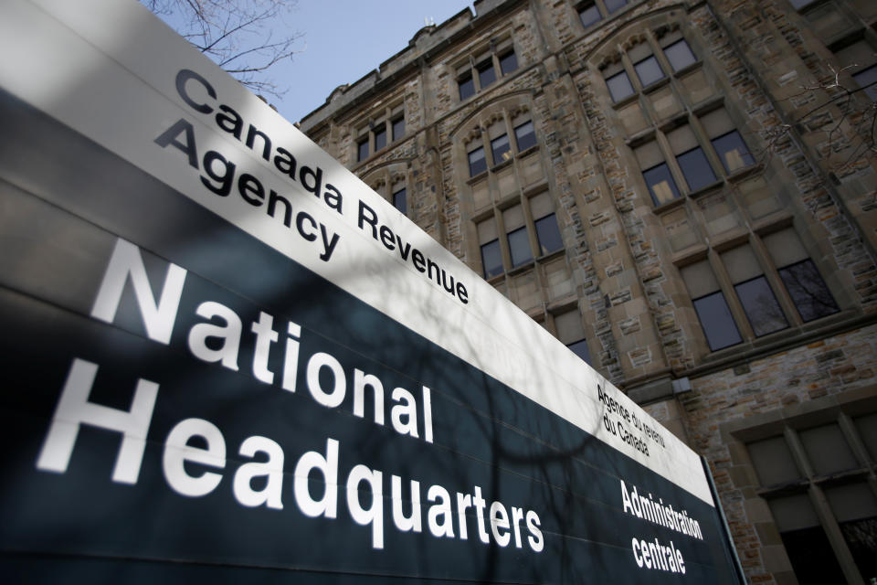 A sign is pictured in front of the Canada Revenue Agency (CRA) national headquarters in Ottawa, Ontario, Canada March 13, 2017. REUTERS/Chris Wattie