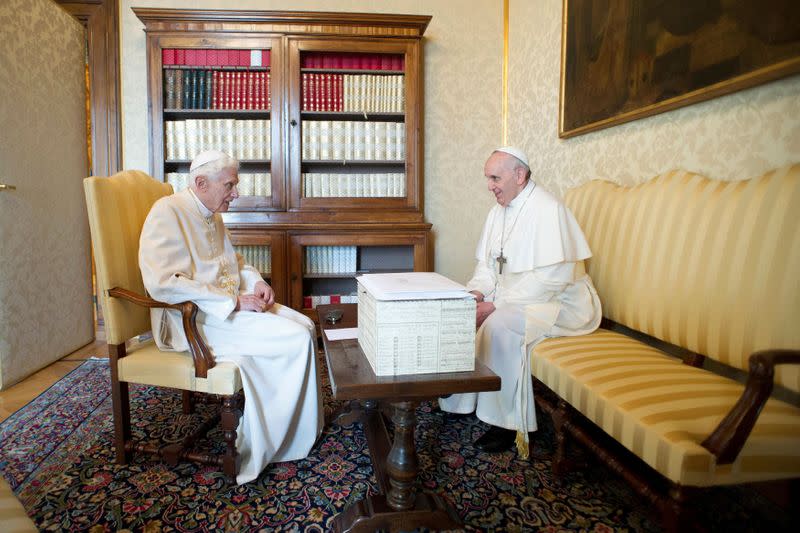 FILE PHOTO: Pope Francis talks with Pope Emeritus Benedict XVI at the Castel Gandolfo summer residence, south of Rome