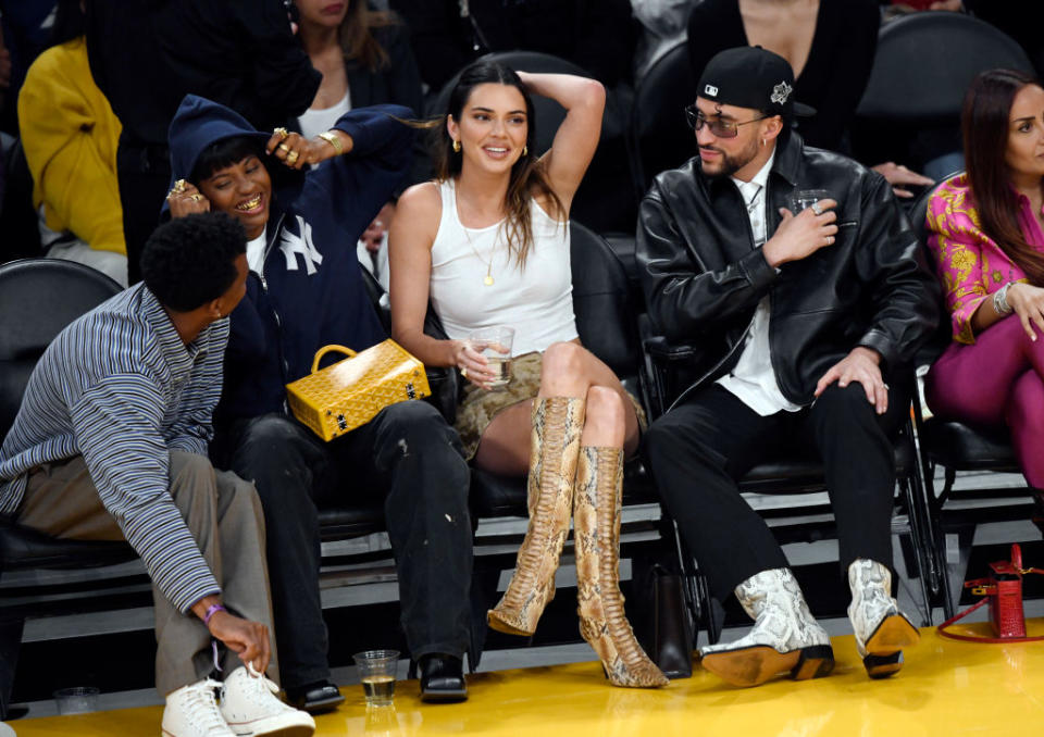 LOS ANGELES, CALIFORNIA - MAY 12: Yung Taco, Renell Medrano, Kendall Jenner and Bad Bunny attend the Western Conference Semifinal Playoff game between the Los Angeles Lakers and Golden State Warriors at Crypto.com Arena on May 12, 2023 in Los Angeles, California. (Photo by Kevork Djansezian/Getty Images)