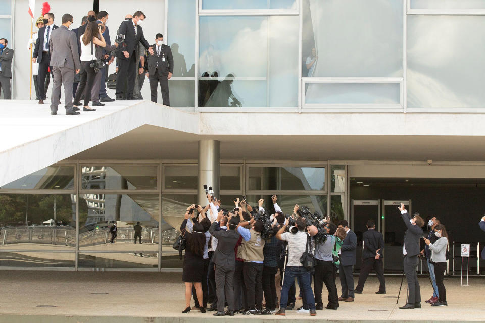 Brazil’s far-right President Bolsonaro addresses journalists from outside the Planalto Palace, the official presidential workplace, in Brasília on May 12 as cases of COVID-19 surge across the country | Joédson Alves—EPA-EFE/Shutterstock