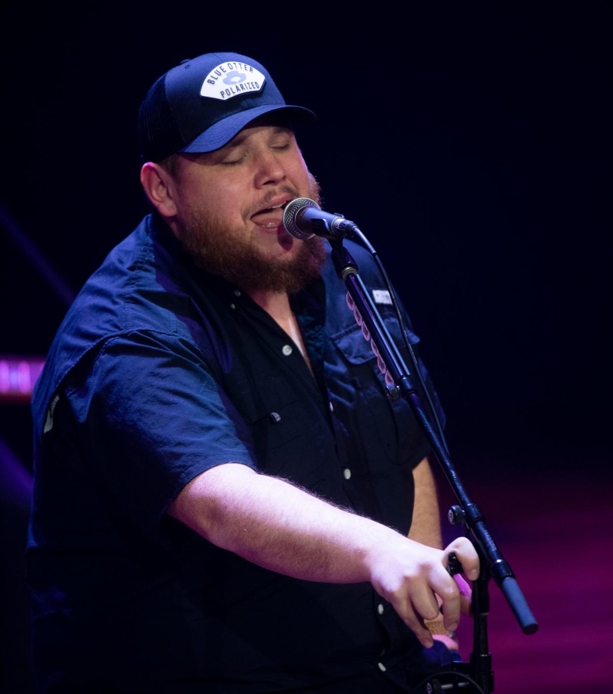 Luke Combs performs during the "Living Lucky With Luke Combs" performance at the Ryman Auditorium in Nashville, Tenn., Tuesday, Feb. 6, 2024. The performance was part of a multi-state lottery experience which was created via collaboration between ECE, Atlas Experiences, and Luke Combs.