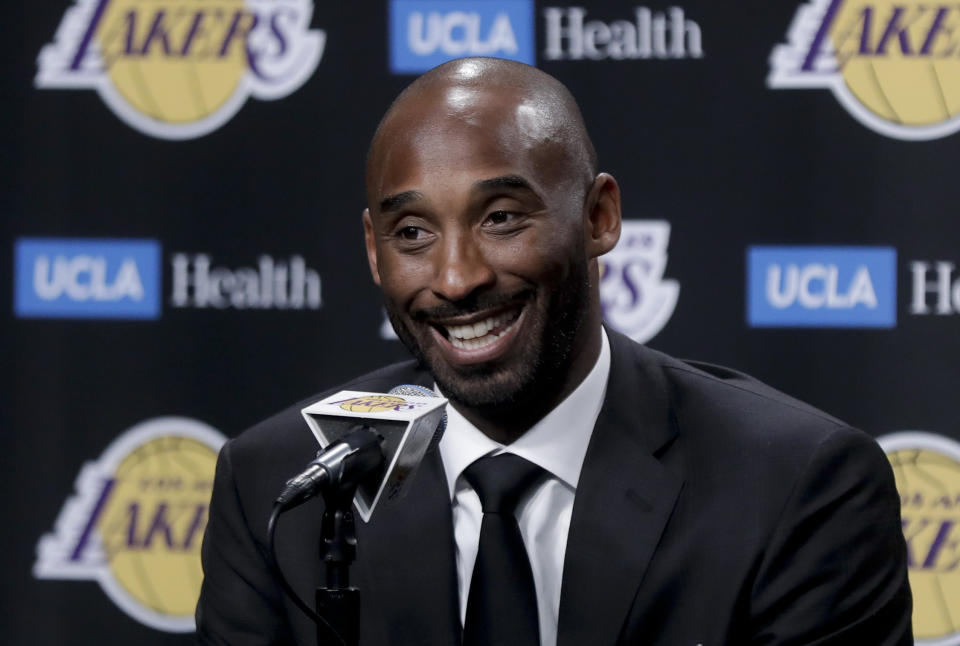 FILE - In this Dc. 18, 2017 file photo, former Los Angeles Laker Kobe Bryant talks during a news conference in Los Angeles. Bryant and fellow NBA greats Tim Duncan and Kevin Garnett headlined a nine-person group announced Saturday, April 4, 2020, as this year’s class of enshrinees into the Naismith Memorial Basketball Hall of Fame. They all got into the Hall in their first year of eligibility, as did WNBA great Tamika Catchings. Two-time NBA champion coach Rudy Tomjanovich, longtime Baylor women’s coach Kim Mulkey, 1,000-game winner Barbara Stevens of Bentley and three-time Final Four coach Eddie Sutton were selected. So was former FIBA Secretary General Patrick Baumann. (AP Photo/Chris Carlson, File)