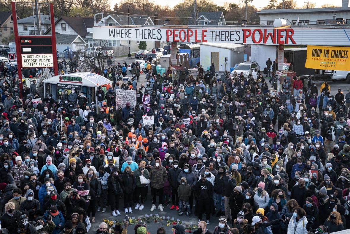 Demonstrators on April 20, 2021 gather outside Cup Foods in Minneapolis to celebrate the murder conviction of former Minneapolis police officer Derek Chauvin in the killing of George Floyd. The third anniversary of Floyd’s murder is May 25, 2023. (AP Photo/John Minchillo, File)