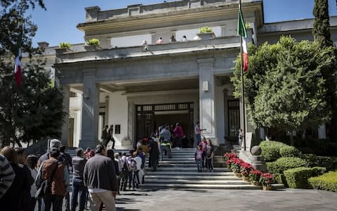 Visitors wait in line to enter the Miguel Aleman house at Los Pinos, the former official residence of the President of Mexico, in Mexico City, - Credit: Bloomberg