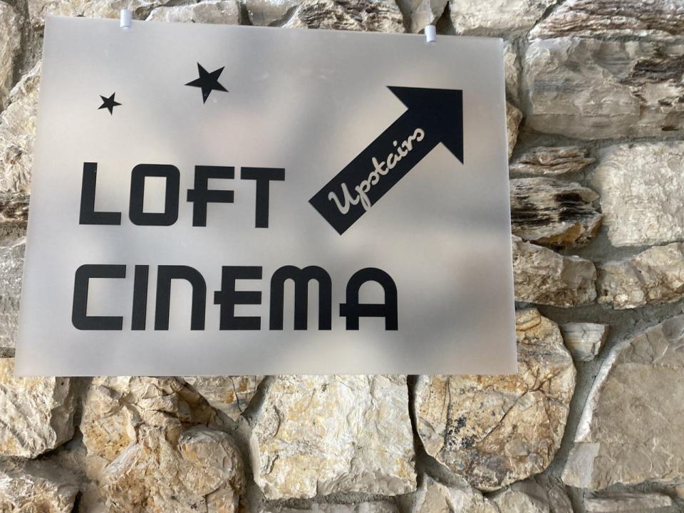 A sign for the Varsity's new Loft Cinema points patrons in the right direction.