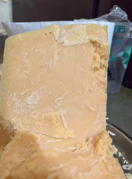 block of parmesan cheese