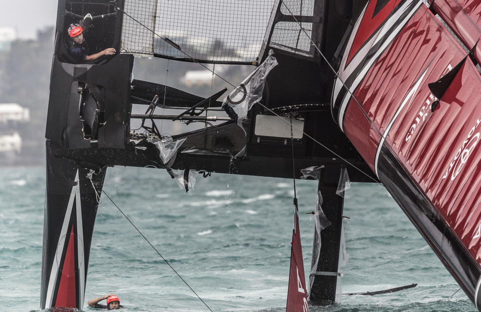 <p>In this photo provided by America’s Cup Event Authority, Emirates Team New Zealand capsizes during an America’s Cup challenger semifinal against Great Britain’s Land Rover BAR on the Great Sound in Bermuda on Tuesday, June 6, 2017. (Ricardo Pinto/ACEA via AP) </p>