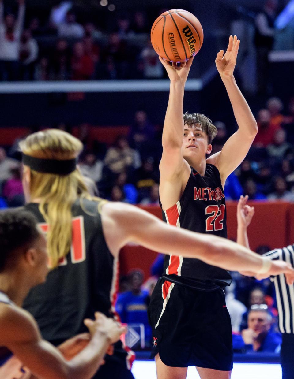 Metamora's Tyson Swanson shoots a three-pointer against Chicago Simeon in the second half of the Class 3A basketball state title game Saturday, March 11, 2023 at State Farm Center in Champaign. The Redbirds took the title 46-42.