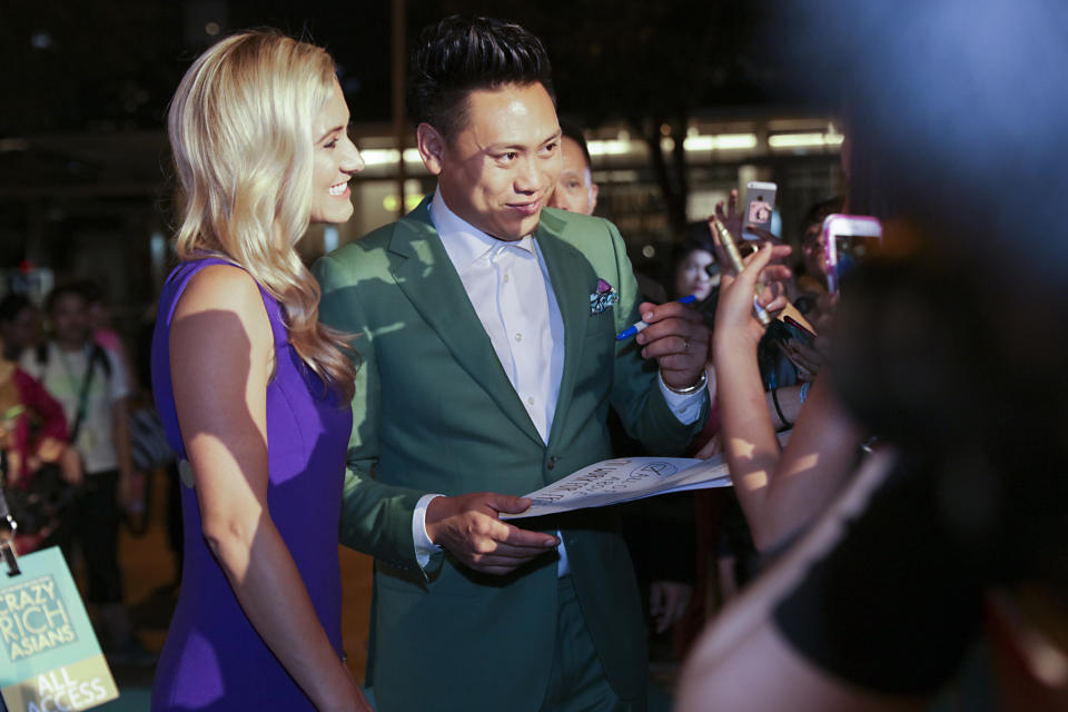 <p>Director Jon M. Chu and wife Kristin Hodge meeting fans during the Singapore premiere of ‘Crazy Rich Asians’, on 21 August 2018. (PHOTO: Yahoo Lifestyle Singapore) </p>