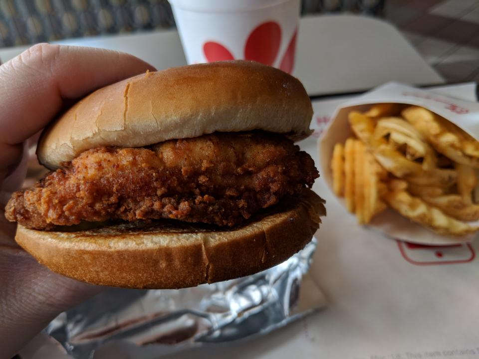 No matter how you feel about the Georgia-based chicken chain&nbsp;<a href="https://www.huffingtonpost.com/entry/lgbtq-eating-chick-fil-a_us_5b1fb4cee4b09d7a3d770c81" data-cke-saved-href="https://www.huffingtonpost.com/entry/lgbtq-eating-chick-fil-a_us_5b1fb4cee4b09d7a3d770c81">for reasons that have nothing to do with fowl</a>, it&rsquo;s an undeniable powerhouse in fast food. I&rsquo;m sitting in my local outpost at 4 p.m. on a Saturday, and everyone is here getting in their last bites of chicken before the company&rsquo;s day of rest on Sunday. <br /><br />I order the #1, since that comes with the original chicken sandwich, waffle fries and a sweet tea (or soda, if you&rsquo;re boring). Though I like the sandwich bun and the pickles, I dutifully take the patty out and get to work/eating.<br /><br />A woman is definitely giving me a weird look for grabbing the patty in one hand and shoving it into my mouth, but I was too focused on the chicken to care. It&rsquo;s a perfectly breaded, hot, juicy piece of chicken. There&rsquo;s not as much of a crunch from the breading as there is at Church&rsquo;s, but it&rsquo;s satisfying nonetheless. I love its distinct, peppery bite. This is a special piece of fried chicken. But it&rsquo;s not my favorite.