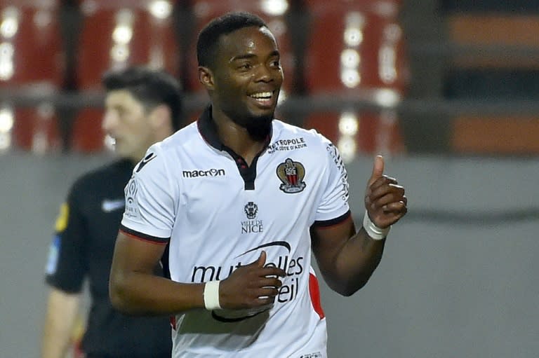 Nice's French midfielder Wylan Cyprien (C) celebrates after scoring during the French L1 football match Lorient vs Nice at the Moustoir stadium in Lorient, western France, on February 18, 2017