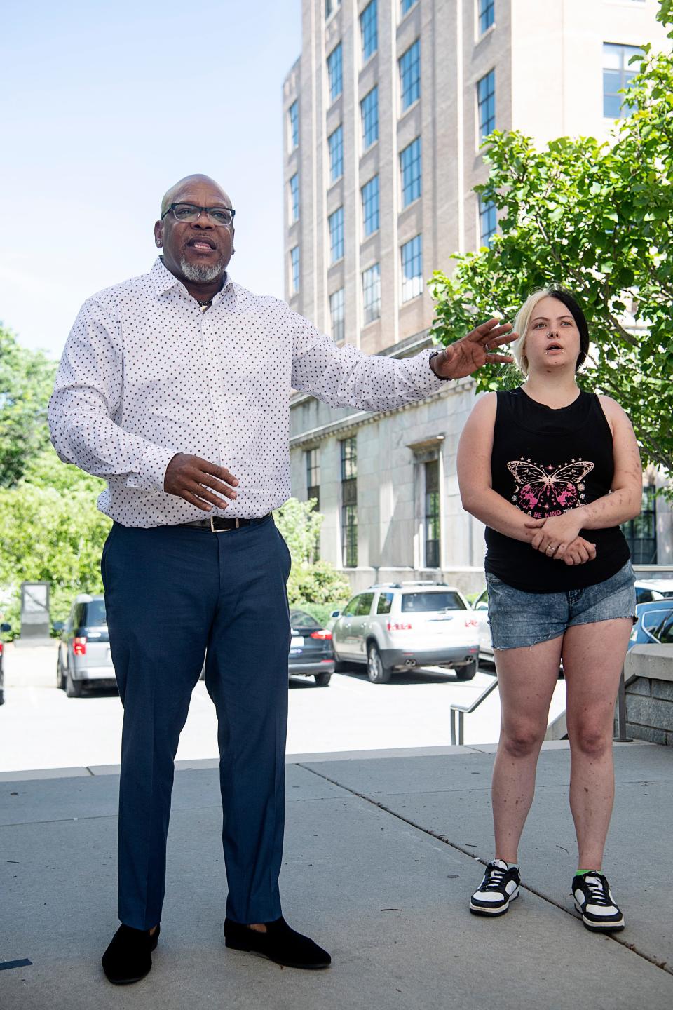 Michael Hayes speaks about police brutality to a group of activists May 17, 2023. Also pictured is Carrie Speigle, Devon Whitmire's fiancé.