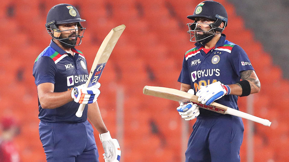 Rohit Sharma and Virat Kohli, pictured here in action for India.