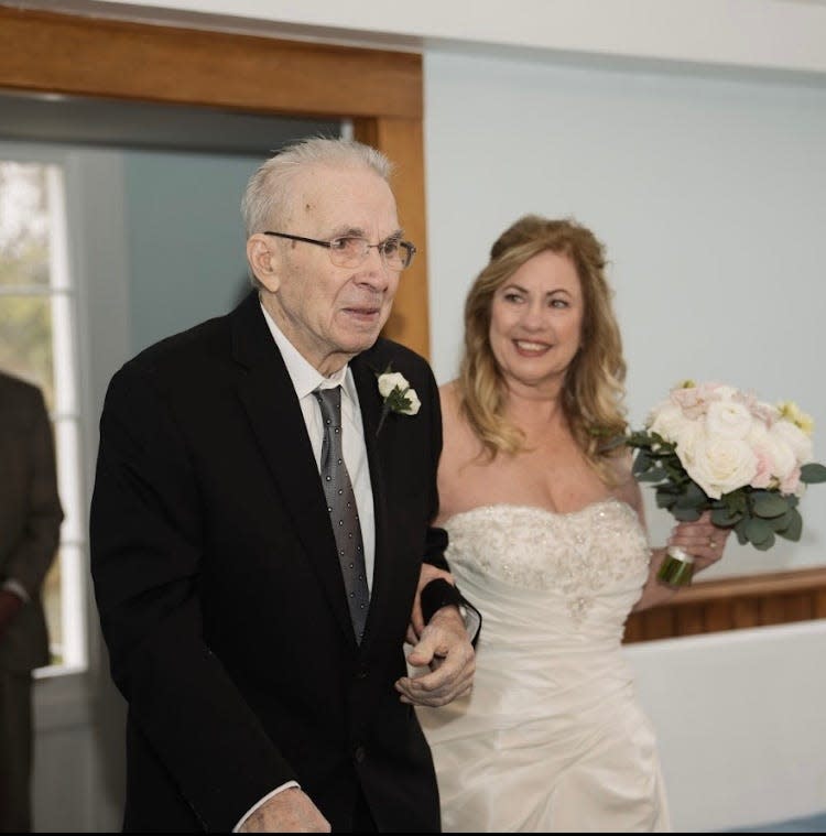 Sandy Sikorski and her father on her wedding day, April 14, 2024.