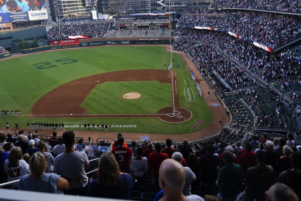 Former Atlanta Braves player Andruw Jones' number is seen on the field at Truist Park, Saturday, Sept. 9, 2023, in Atlanta. Jones who won 10 Gold Gloves in a career that began with 12 seasons in Atlanta, became the 11th Braves player or manager to have his number retired on Saturday night. The honor could add momentum to his candidacy for the Baseball Hall of Fame. Jones' 25 was retired before the Braves' game against the Pittsburgh Pirates. (AP Photo/Brynn Anderson)