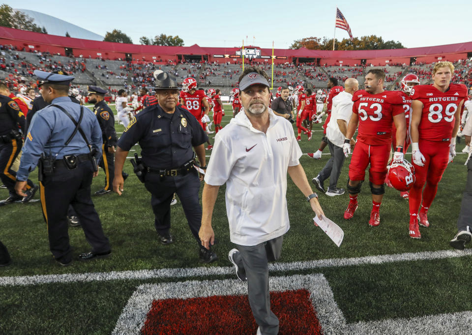 Virginia Tech head coach Brett Pry walks off the field after an NCAA college football game against Rutgers, Saturday, Sept. 16, 2023, in Piscataway, N.J. (Andrew Mills/NJ Advance Media via AP)