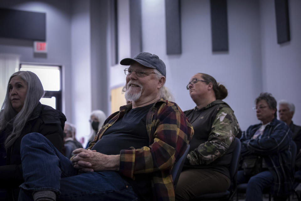 Members of the public attend Cochise County Board of Supervisors meeting to provide feedback on the proposed transfer of election functions and duties to the county recorder, Tuesday, Feb. 14, 2023, in Bisbee, Ariz. (AP Photo/Alberto Mariani)