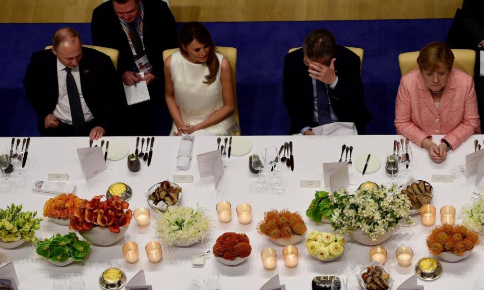 Vladimir Putin, Melania Trump, Mauricio Macri, and Angela Merkel attend a banquet at the 2017 G20 summit in Hamburg. This year’s will be in Argentina.