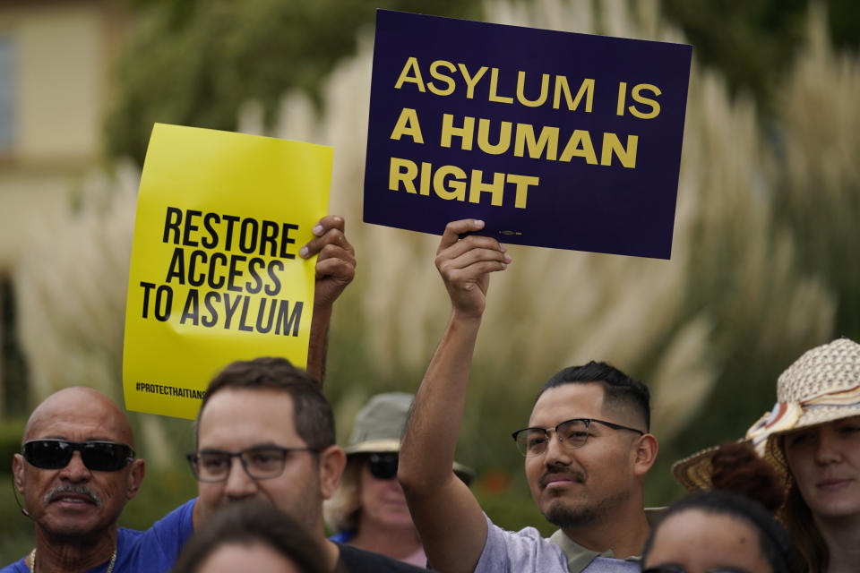 Demonstrators gather outside of the Richard H. Chambers U.S. Court of Appeals ahead of an asylum hearing, Tuesday, Nov. 7, 2023, in Pasadena, Calif. (AP Photo/Marcio Jose Sanchez)