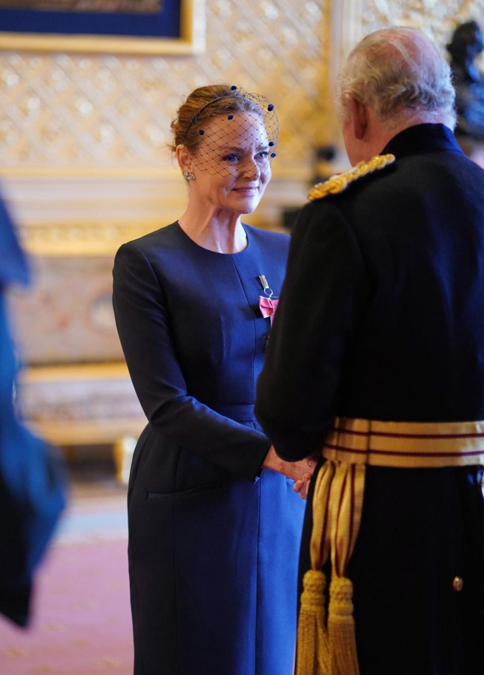 Stella McCartney being made a Commander of the Order of the British Empire by King Charles III (PA)